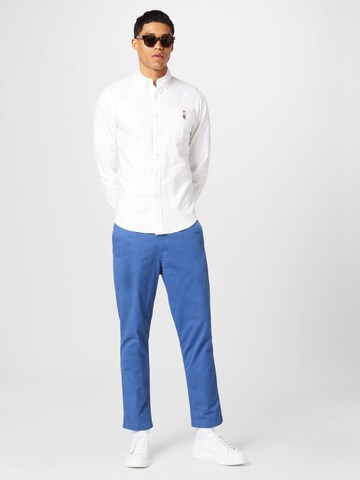 Polo Ralph Lauren Bootcut Bukse 'PREPSTERP' i blå