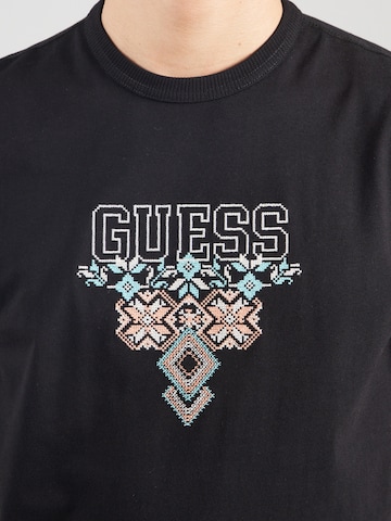 GUESS חולצות בשחור