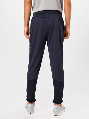 ELLESSE Slim fit Workout Pants in Blue
