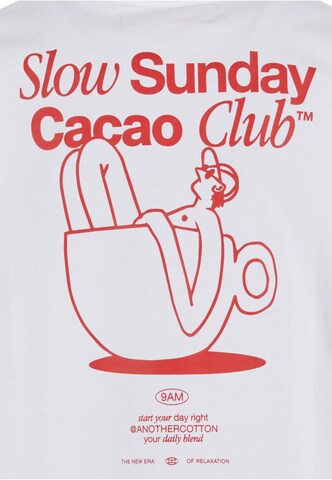 Maglietta 'Slow Sunday Cacao Club' di Another Cotton Lab in bianco