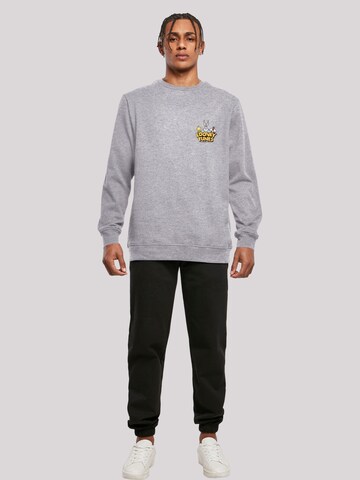 F4NT4STIC Sweatshirt 'Looney Tunes Group Faux Pocket' in Grau