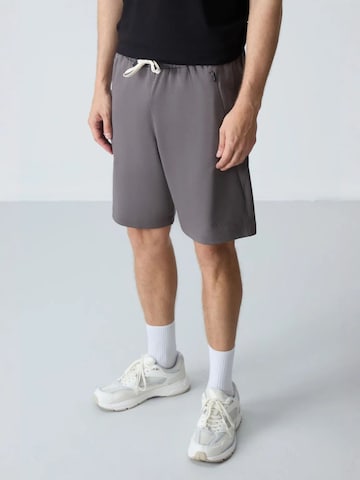 Wide leg Pantaloni di Tommy Life in grigio