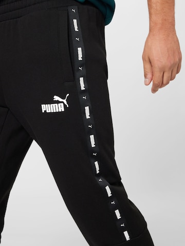 PUMA Tapered Sporthose in Schwarz