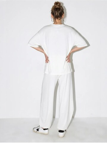 Pantalons de tailleur Bianco Lucci en blanc