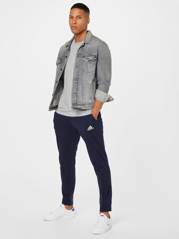 ADIDAS SPORTSWEAR Tapered Sports trousers 'Essentials Tapered Cuff' in Blue