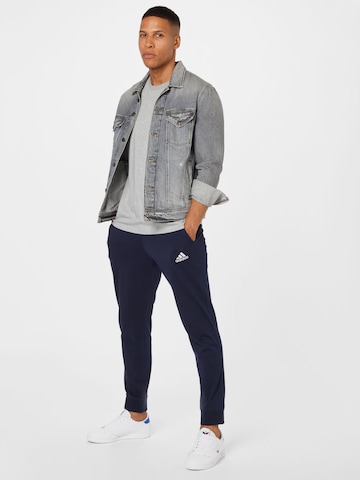 Effilé Pantalon de sport 'Essentials Tapered Cuff' ADIDAS SPORTSWEAR en bleu