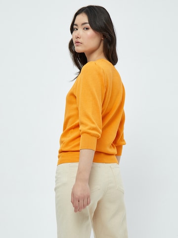 Pull-over 'Tana' Peppercorn en orange