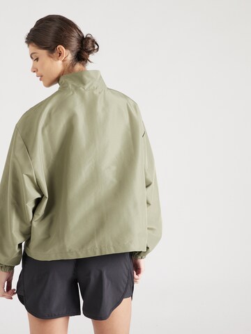 new balance - Chaqueta de entretiempo en verde