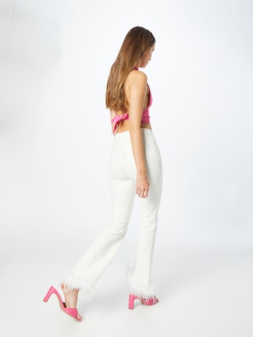 Flared Jeans di Edikted in bianco