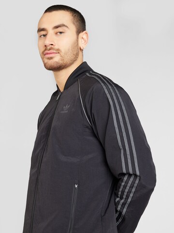 Geacă de primăvară-toamnă de la ADIDAS ORIGINALS pe negru