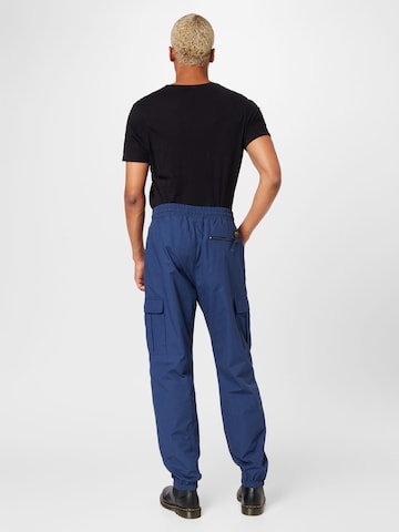 Carhartt WIP tavaline Klapptaskutega püksid, värv sinine