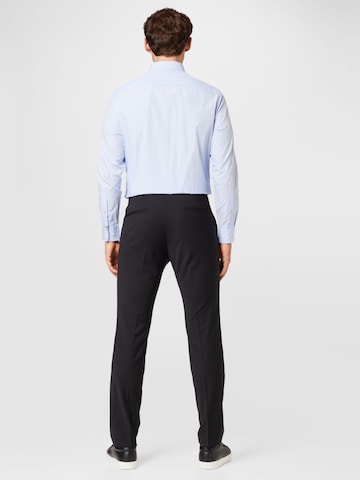 regular Pantaloni con piega frontale 'Hesten' di HUGO Red in nero