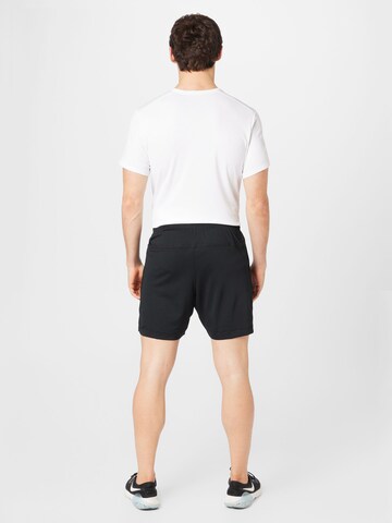 NIKE - regular Pantalón deportivo en negro