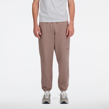 new balance Tapered Pants in Brown: front