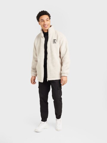 Karl Kani Fleece Jacket in Beige