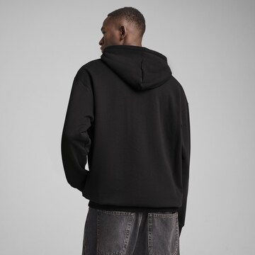 PUMA Sweatshirt 'Equal Love Confederation' in Zwart