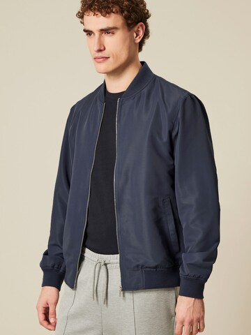 Next Tussenjas in Blauw
