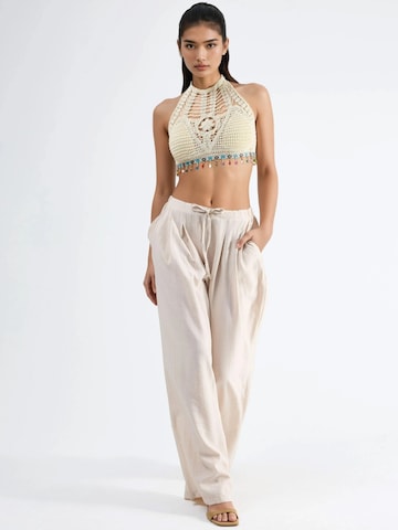 Wide leg Pantaloni con pieghe di Busem in beige