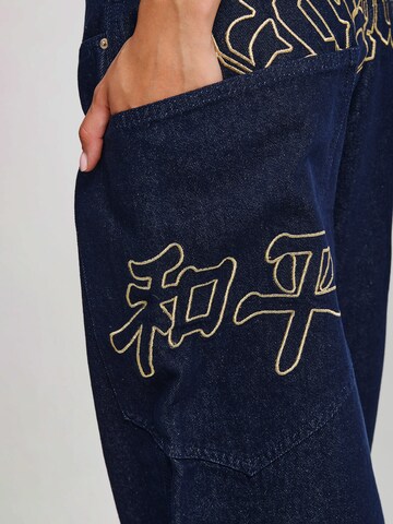 Wide Leg Jean Ed Hardy en bleu : sur le côté