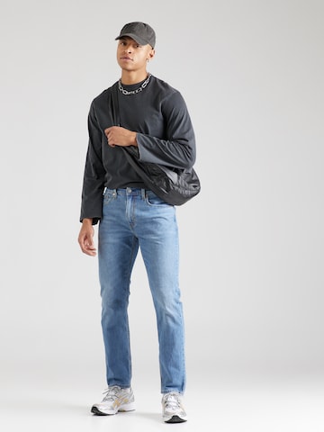 LEVI'S ® Tapered Jeans '502™  Taper Performance Cool' in Blue