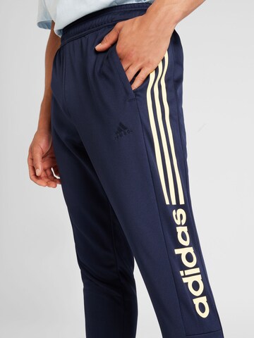 ADIDAS SPORTSWEAR Конический (Tapered) Спортивные штаны 'TIRO Wordmark' в Синий