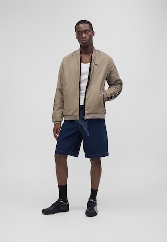 PUMA Jacke in Grau
