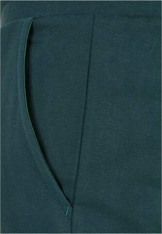 Urban Classics Alt kitsenev Klapptaskutega püksid, värv roheline