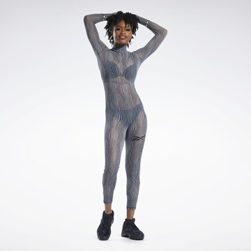 Tuta jumpsuit 'Cardi B' di Reebok in grigio