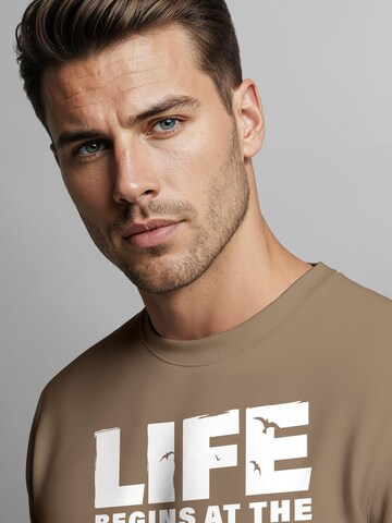Neverless Sweatshirt 'life begins' in Brown
