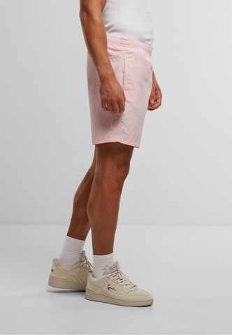 Shorts de bain Karl Kani en rose