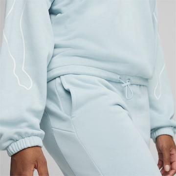 PUMA Sportief sweatshirt 'MOTION' in Blauw