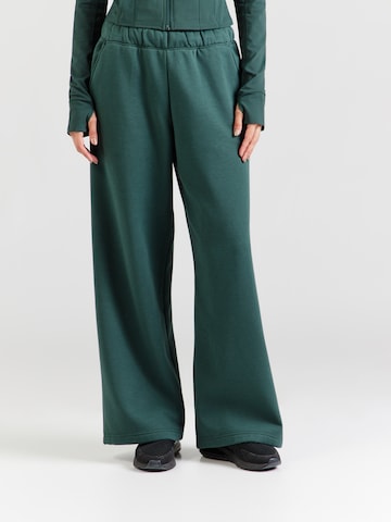 Fabletics - Perna larga Calças de desporto em verde: frente
