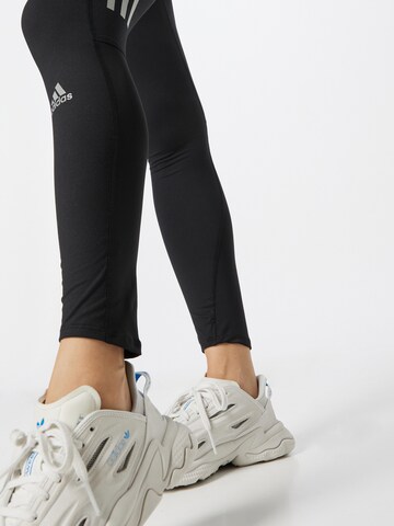 ADIDAS SPORTSWEAR Skinny Sporthose 'Own The Run Winter' in Schwarz
