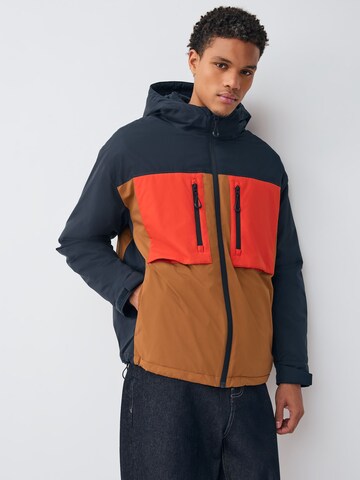 Next - Chaqueta funcional 'ThermoGen' en azul: frente