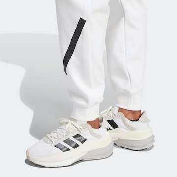 ADIDAS SPORTSWEAR Конический (Tapered) Спортивные штаны 'W Z.N.E. PT' в Белый