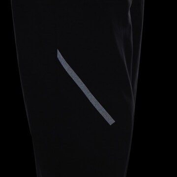 Effilé Pantalon de sport Reebok en noir