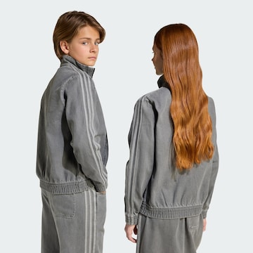 ADIDAS ORIGINALS - Chaqueta de entretiempo 'Firebird' en gris