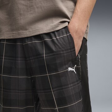 PUMA Regular Sporthose 'T7' in Schwarz