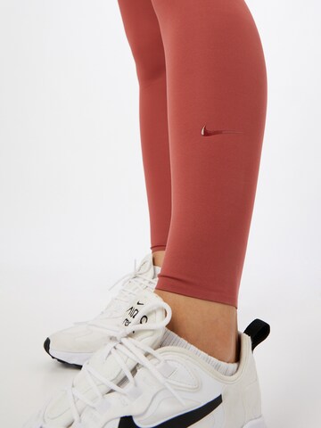 NIKE Skinny Urheiluhousut värissä ruskea