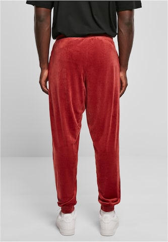 Loosefit Pantaloni de la Karl Kani pe roșu