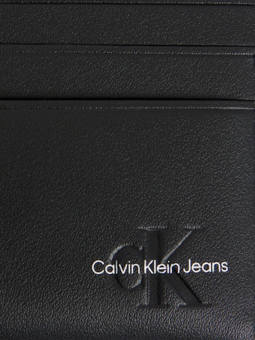Porte-monnaies Calvin Klein Jeans en noir