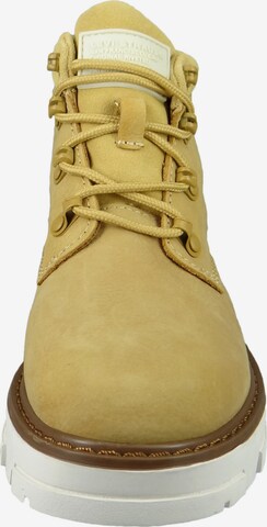 LEVI'S ® Lace-Up Ankle Boots in Yellow