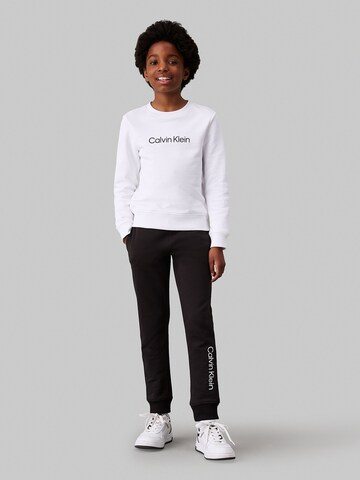 Calvin Klein Jeans - Tapered Calças em preto