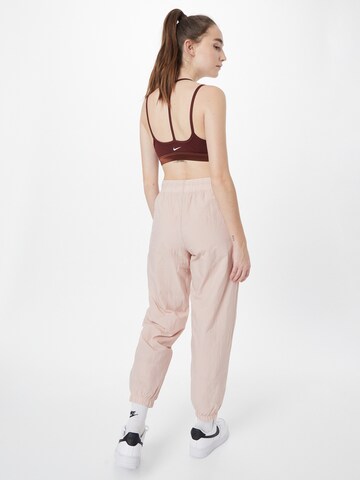 Nike SportswearTapered Hlače 'Essential' - roza boja