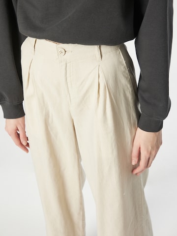 Wide leg Pantaloni con pieghe di Urban Classics in beige