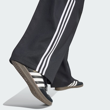 Wide leg Pantaloni di ADIDAS ORIGINALS in nero