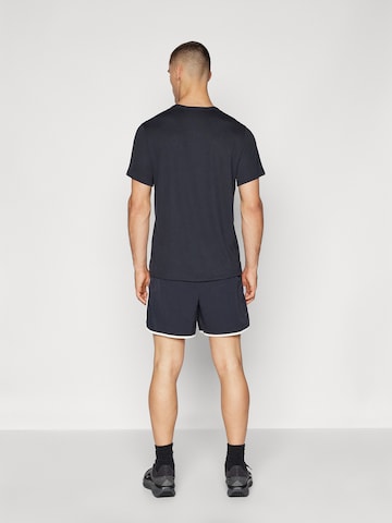 NIKE regular Παντελόνι φόρμας 'HERITAGE' σε μαύρο