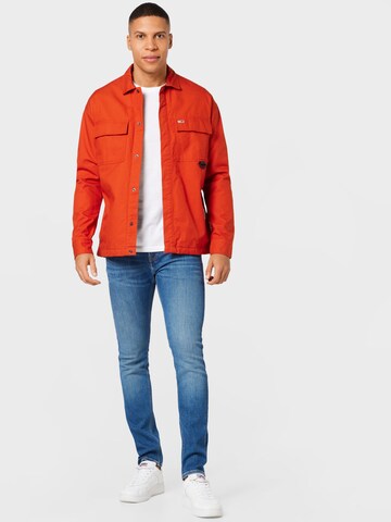 Tommy Jeans Tussenjas in Oranje