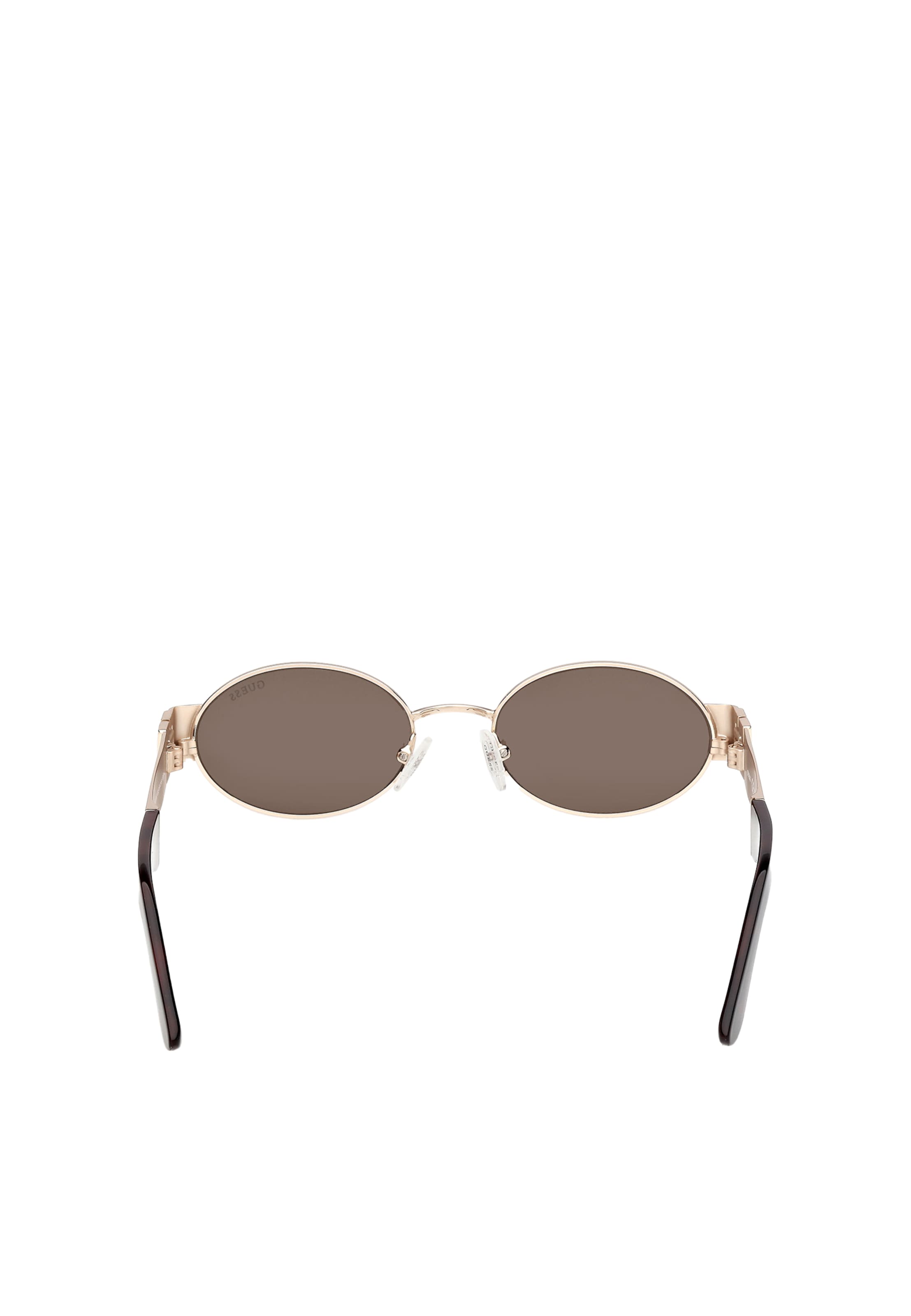 GUESS Sunglasses in Gold