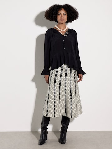 Apricot Abstract Stripe Knitted A-Line Midi Skirt ' ' in Schwarz